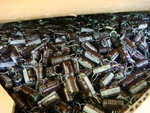 One Box 6136 Pcs Nichicon 82UF / 25V Aluminum Electrolytic Capacitors - Unused. Fixed Price $500.00.