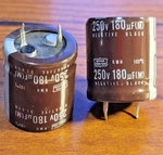 180UF 250VDC Nippon Cheni-con Electrolytic Capacitors Snap-in Kmh. Fixed Price $8.00.