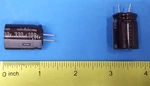(15 Pcs) Capacitor, UPJ2A331MHD6, Nichicon 330 Uf/mf 100V 20% Cut Leads. Fixed Price $15.00.