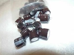23 Nichicon Aluminum Electrolytic Capacitors 1000UF. Fixed Price $22.03.
