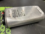 21L3016 - Ge 8UF 370VAC Oil Oval Capacitor. Fixed Price $45.78.