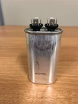 New Packard POC17.5 G21-904 Run Capacitor Mfd 370V Oval Motor. Fixed Price $18.00.