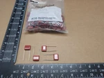 (100 Pcs) ECQ-E2105KF Panasonic, Radial Film Capacitor, 1UF, 250VDC, 10%. Fixed Price $27.75.