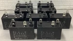 Lot Of 9 Shizuki CH120100A Capacitors 200VAC (B578). Fixed Price $80.00.
