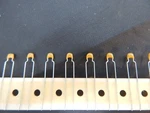 Avx Ceramic Capacitor 0.1UF 50V Z5U 20% Radial 5.08MM 85 - Reel Of 3000. Fixed Price $200.00.