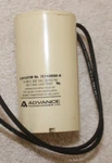 One (1) Advance 7C140M30R Capacitor 14MFD 300VAC 50/60HZ. Fixed Price $14.00.