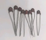 8 Pieces 100 Pf +- 10% Capacitor Ceramic Disc Vintage Erie. Fixed Price $10.90.