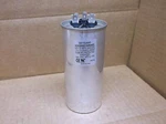 Hartland Controls HCKS550D150R440Z 55+15 Mfd X Vac Round Dual Run Capacitor. Fixed Price $5.00.
