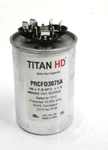 Packard Titan Hd PRCFD3075A Motor Run Capacitor Round 30+7.5 Mfd 440/370 Vac. Fixed Price $17.49.