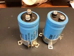 Set Of Mallory CGS103U025U3C 10000 Mfd Capacitor W/ Mounting RING(LPW78I). Fixed Price $45.99.