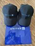 United Airlines Black Baseball Caps (2) Size S/m Nu-fit & Headtotoe Adjustible. Fixed Price $39.95.