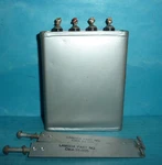 Cornell Dubilier Oil Can Capacitor 4/4/2UF 600VDC W/ Mounts. Fixed Price $26.95.