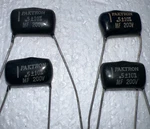 0.5 Uf 200V Metallized Polyester Film Radial Capacitors New Lot Of 4 By Paktron. Fixed Price $8.50.