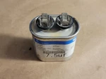 Ge 27L566 Furnace Capacitor Oval 7.5UF HC91CA007D. Fixed Price $21.37.