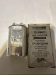 Trade Pro 12.5 Mfd Oval Capacitor 370/440 Vac. Fixed Price $14.59.