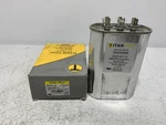Titan Pro TRCFD555 Run Capacitor 55+5 Mfd 440/370V Oval. Fixed Price $10.88.