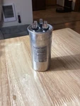 Titan Pro Run Capacitor TRCFD355 35+5 Mfd 440/370 Vac Round. Fixed Price $16.44.